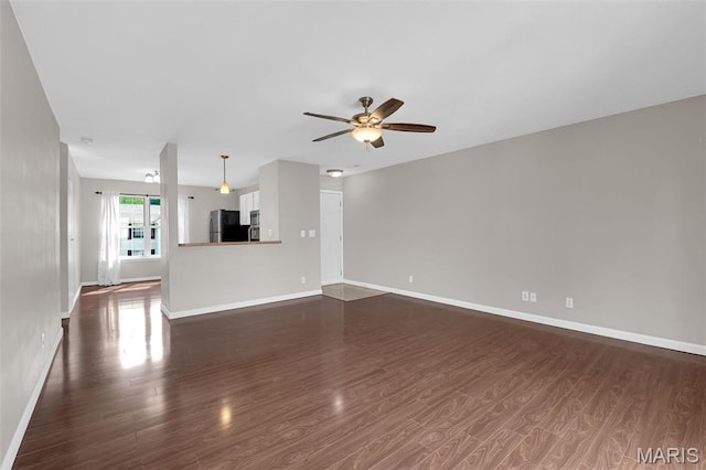 800 Sugar Valley Ct Unit A, Saint Peters, MO 63376 - unfurnished living room with ceiling fan and dark wood-type flooring