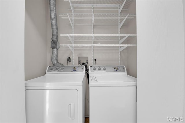 800 Sugar Valley Ct Unit A, Saint Peters, MO 63376 - laundry room with washing machine and clothes dryer