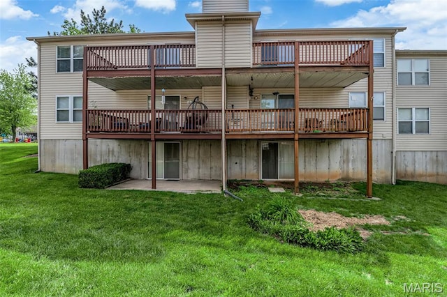 800 Sugar Valley Ct Unit A, Saint Peters, MO 63376 - back of house featuring a yard, a wooden deck, a balcony, and a chimney
