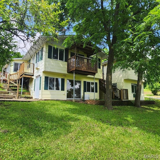 6380 Dolde Rd, Cedar Hill, MO 63016 - rear view of property with a balcony and a yard