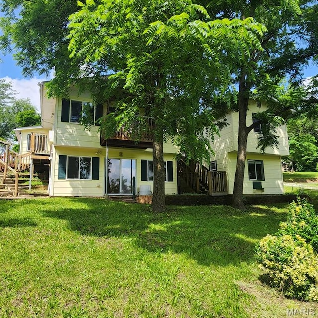 6380 Dolde Rd, Cedar Hill, MO 63016 - rear view of house featuring stairway, a yard, and a wooden deck