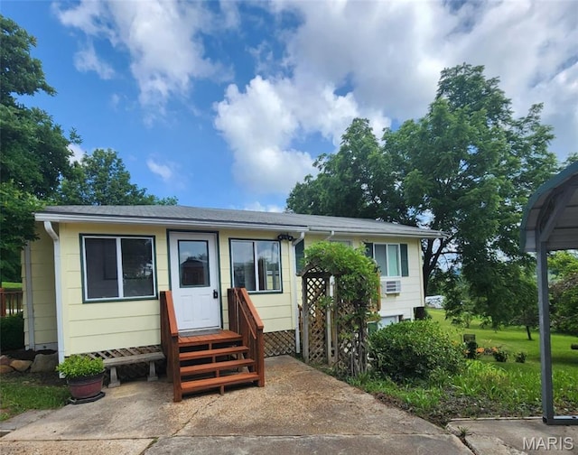6380 Dolde Rd, Cedar Hill, MO 63016 - view of front of house featuring roof with shingles, cooling unit, and entry steps