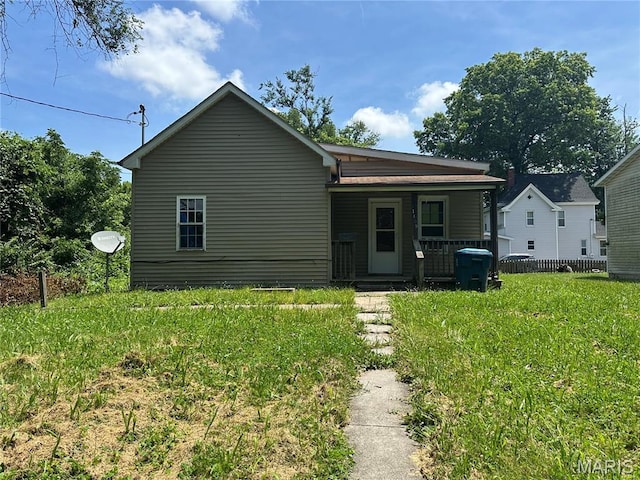 1409 Monroe St, Alton, IL 62002 - bungalow-style home featuring a porch