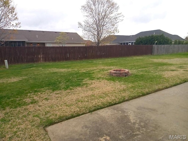 1107 Daffodil St, Sikeston, MO 63801 - view of yard with an outdoor fire pit