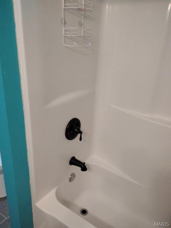 1107 Daffodil St, Sikeston, MO 63801 - full bathroom featuring shower / washtub combination