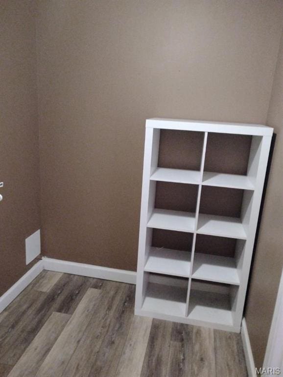 1107 Daffodil St, Sikeston, MO 63801 - detailed view of wood finished floors and baseboards