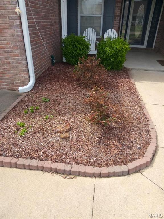 1107 Daffodil St, Sikeston, MO 63801 - exterior view of brick siding