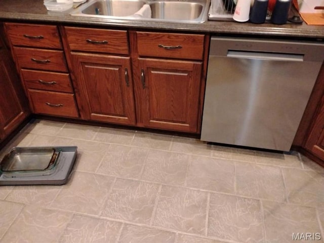 1107 Daffodil St, Sikeston, MO 63801 - kitchen featuring stainless steel dishwasher and dark countertops
