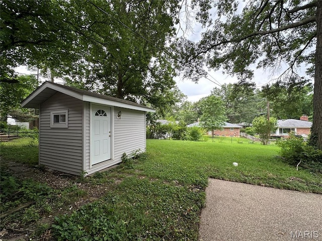 9334 Litzsinger Rd, Rock Hill, MO 63144 - view of yard featuring a storage unit