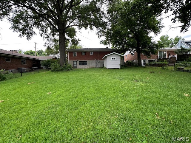 9334 Litzsinger Rd, Rock Hill, MO 63144 - view of yard with a storage unit