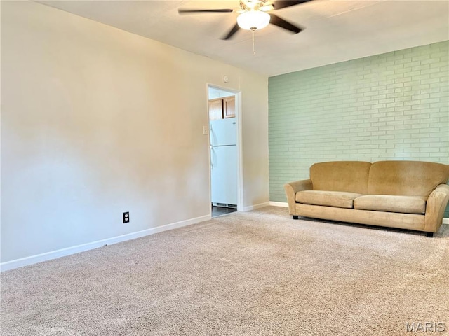 3212 Rodger Ave, Granite City, IL 62040 - living room featuring a ceiling fan, carpet floors, and brick wall