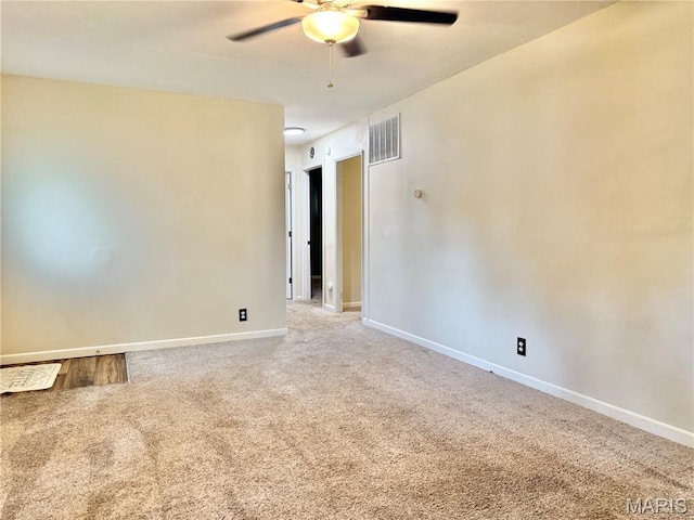 3212 Rodger Ave, Granite City, IL 62040 - carpeted empty room with ceiling fan and baseboards