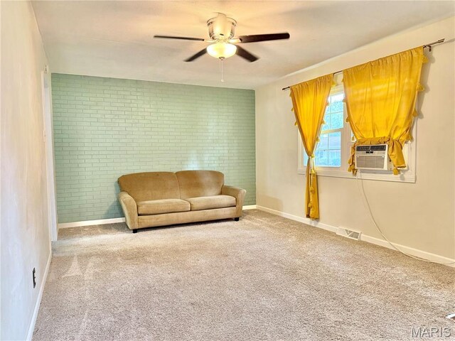3212 Rodger Ave, Granite City, IL 62040 - sitting room with cooling unit, ceiling fan, carpet, and brick wall
