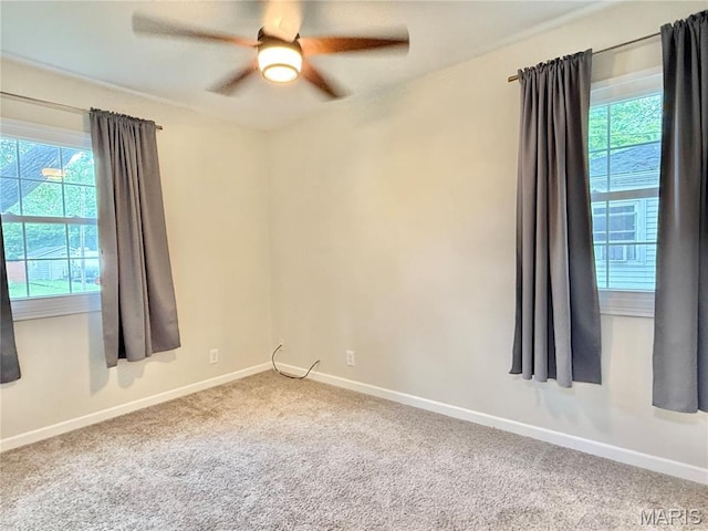 3212 Rodger Ave, Granite City, IL 62040 - carpeted spare room featuring healthy amount of natural light and a ceiling fan