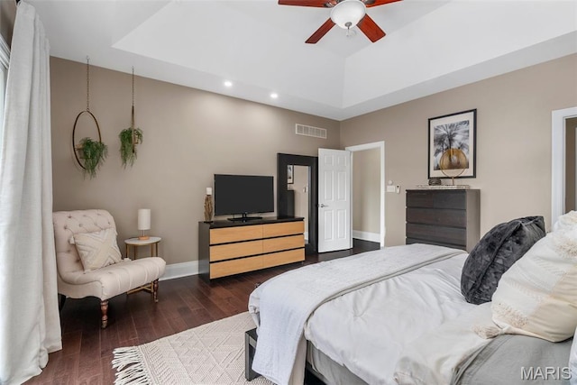4304 Austin Pass Ct, Saint Charles, MO 63304 - bedroom featuring dark wood-style flooring, a raised ceiling, recessed lighting, a towering ceiling, and ceiling fan