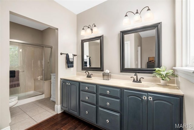 4304 Austin Pass Ct, Saint Charles, MO 63304 - full bathroom with double vanity and a shower stall
