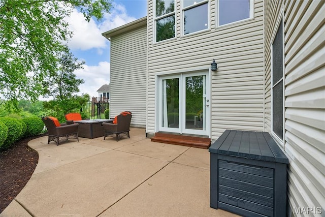 4304 Austin Pass Ct, Saint Charles, MO 63304 - view of patio / terrace featuring a fire pit
