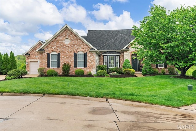 4304 Austin Pass Ct, Saint Charles, MO 63304 - traditional-style home with brick siding, a front lawn, an attached garage, and concrete driveway