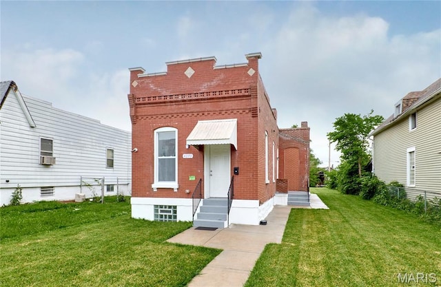 4275 E Ashland Ave, Saint Louis, MO 63115 - view of front of home featuring brick siding and entry steps