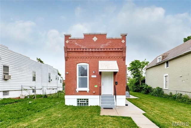 4275 E Ashland Ave, Saint Louis, MO 63115 - view of front of property featuring brick siding and cooling unit