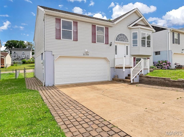 3178 5 Oaks Dr, Arnold, MO 63010 - split foyer home featuring an attached garage and concrete driveway