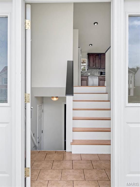 3178 5 Oaks Dr, Arnold, MO 63010 - staircase featuring tile patterned floors