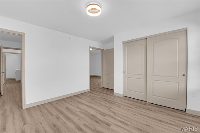 1531 Piedmont Cir Unit 1531, Saint Peters, MO 63304 - unfurnished bedroom with light wood-type flooring and a closet