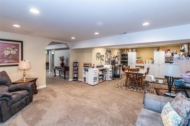 221 Meriwether Lewis Dr, Ofallon, MO 63368 - living area with carpet floors, recessed lighting, and arched walkways