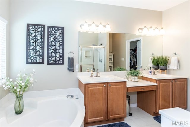 221 Meriwether Lewis Dr, Ofallon, MO 63368 - bathroom featuring a shower stall, double vanity, a bath, and a walk in closet