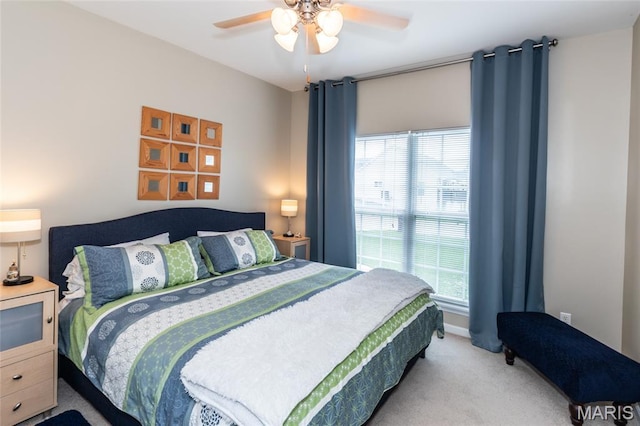 221 Meriwether Lewis Dr, Ofallon, MO 63368 - carpeted bedroom with multiple windows and a ceiling fan