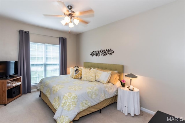 221 Meriwether Lewis Dr, Ofallon, MO 63368 - carpeted bedroom with a ceiling fan and baseboards