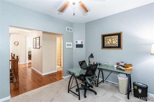 221 Meriwether Lewis Dr, Ofallon, MO 63368 - carpeted office space with a ceiling fan and wood finished floors