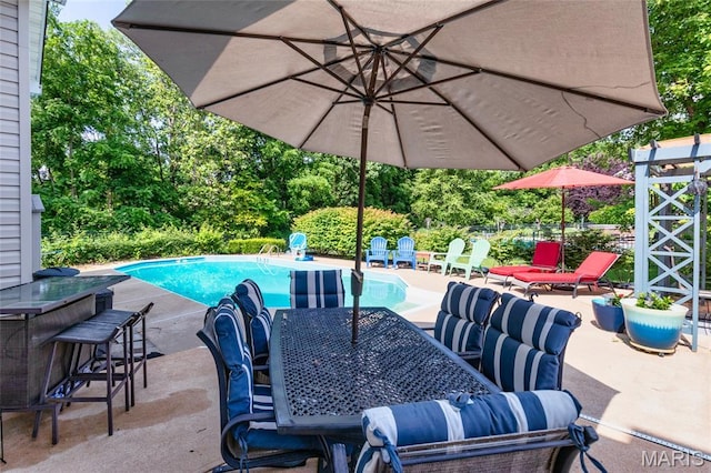 221 Meriwether Lewis Dr, Ofallon, MO 63368 - outdoor pool with a patio area and outdoor dining area