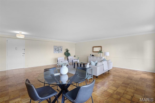 4466 W Pine Blvd Unit 7D, Saint Louis, MO 63108 - dining area with crown molding and baseboards
