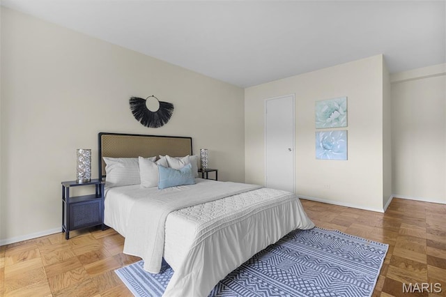 4466 W Pine Blvd Unit 7D, Saint Louis, MO 63108 - bedroom featuring baseboards