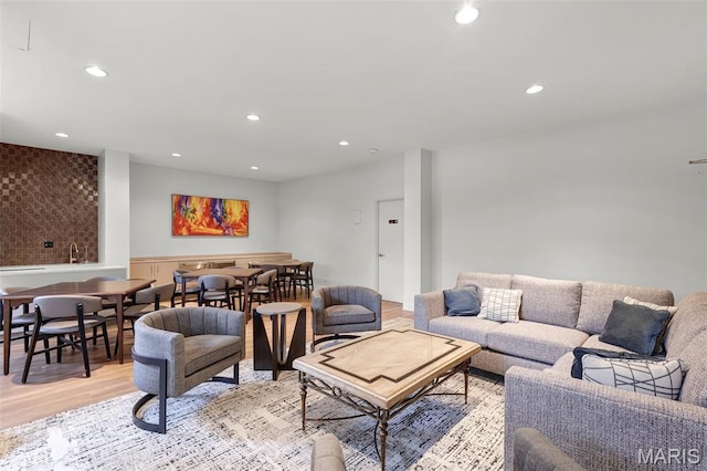4466 W Pine Blvd Unit 7D, Saint Louis, MO 63108 - living area featuring light wood-type flooring and recessed lighting