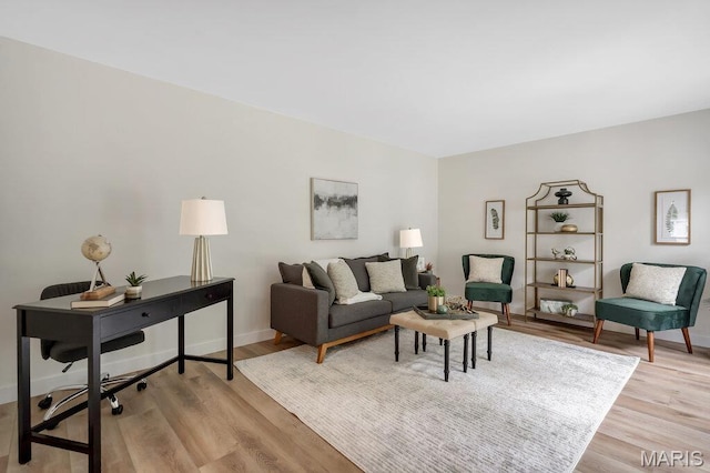 1254 Jade Wind Cir, Ballwin, MO 63011 - living room with a desk and light wood finished floors