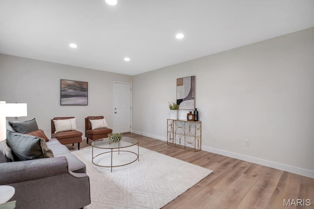 1254 Jade Wind Cir, Ballwin, MO 63011 - living room featuring light wood-style floors and recessed lighting