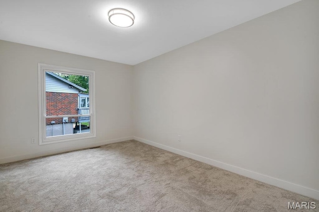 1254 Jade Wind Cir, Ballwin, MO 63011 - unfurnished room featuring carpet and baseboards
