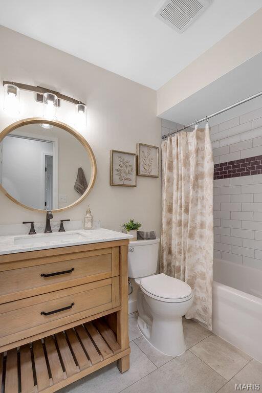 1254 Jade Wind Cir, Ballwin, MO 63011 - bathroom with vanity, tile patterned flooring, and shower / tub combo