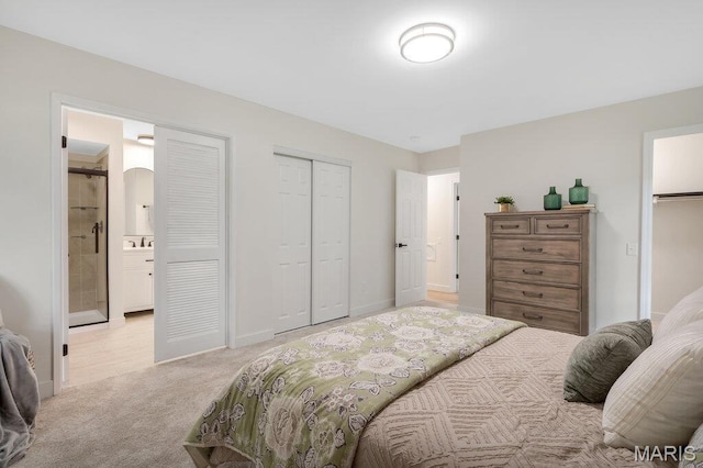 1254 Jade Wind Cir, Ballwin, MO 63011 - bedroom with light carpet, a closet, ensuite bathroom, and arched walkways