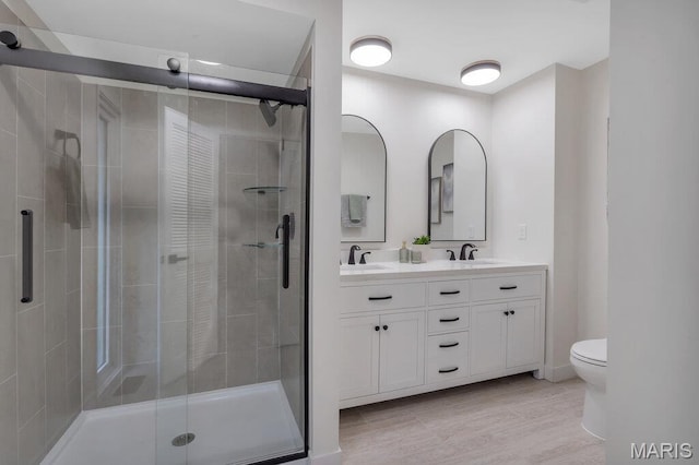 1254 Jade Wind Cir, Ballwin, MO 63011 - bathroom with double vanity and a stall shower
