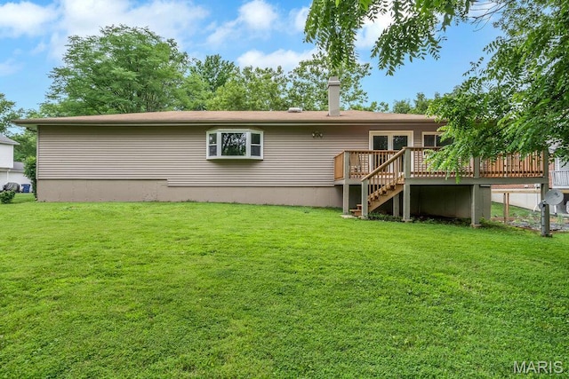1254 Jade Wind Cir, Ballwin, MO 63011 - back of house with a wooden deck, a lawn, and a chimney
