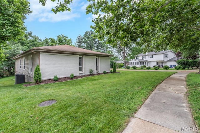 1254 Jade Wind Cir, Ballwin, MO 63011 - view of home's exterior with a yard and brick siding