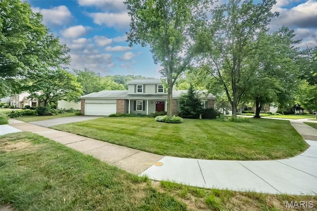 14898 Pheasant Hill Ct, Chesterfield, MO 63017 - traditional-style home with an attached garage, driveway, brick siding, and a front lawn