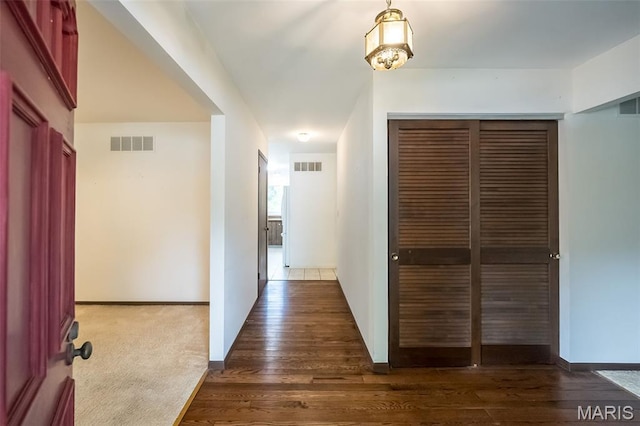 14898 Pheasant Hill Ct, Chesterfield, MO 63017 - hallway with dark wood finished floors