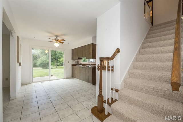 14898 Pheasant Hill Ct, Chesterfield, MO 63017 - stairway with a ceiling fan and tile patterned flooring