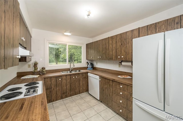 14898 Pheasant Hill Ct, Chesterfield, MO 63017 - kitchen with white appliances, butcher block countertops, under cabinet range hood, and light tile patterned floors