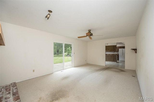 14898 Pheasant Hill Ct, Chesterfield, MO 63017 - unfurnished living room featuring light colored carpet and ceiling fan