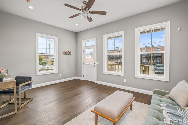 3400 Vista Ave, Saint Louis, MO 63104 - living room with ceiling fan, dark wood-style floors, and recessed lighting